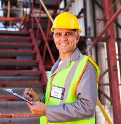 Technician doing in-plant Dust Hazard Analysis | AST Engineering